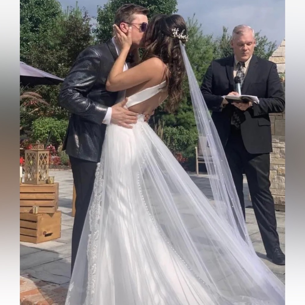 Van Der Velde luxury bridal satin backless wedding dress. Size 2